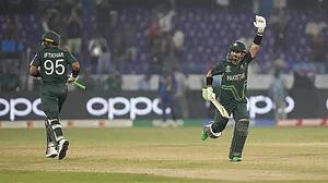 Pakistan's Mohammad Rizwan, right, and Iftikhar Ahmed celebrate their win against Sri Lanka