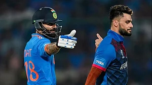 Virat Kohli and Naveen-ul-Haq during the match between India and Afghanistan in Delhi.
