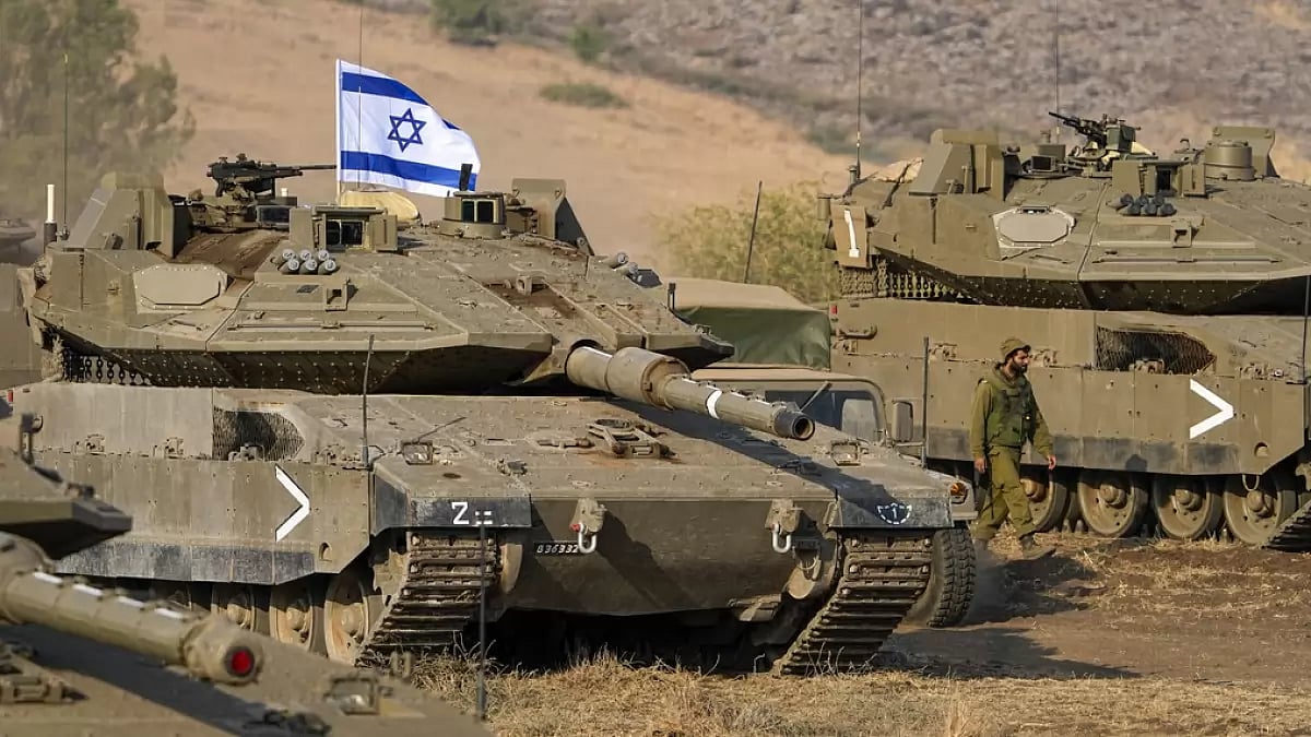 Israeli tanks stationed near the border with Lebanon.