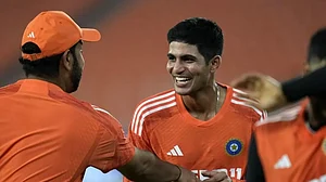 Shubman Gill (R) trains along with Rohit Sharma in Ahmedabad on Friday.