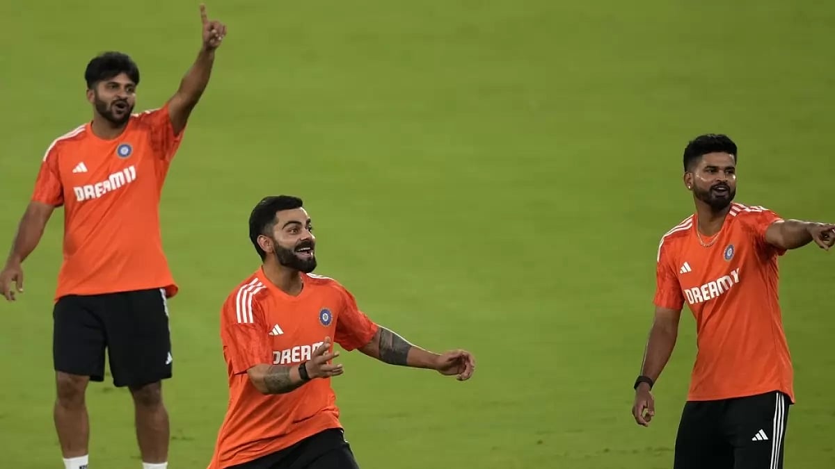 Virat Kohli (centre), Shardul Thakur (left) and Shreyas Iyer train in Ahmedabad on Friday.