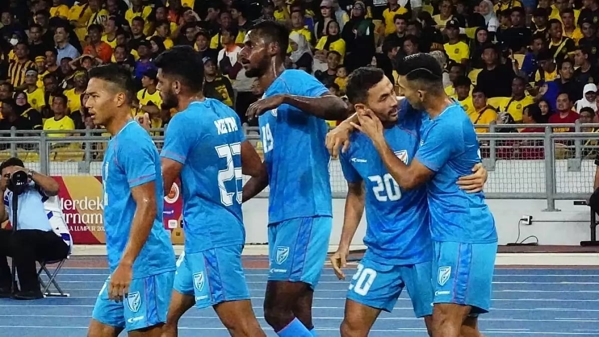 Indian men's football team celebrate a goal against Malaysia in Kuala Lumpur.