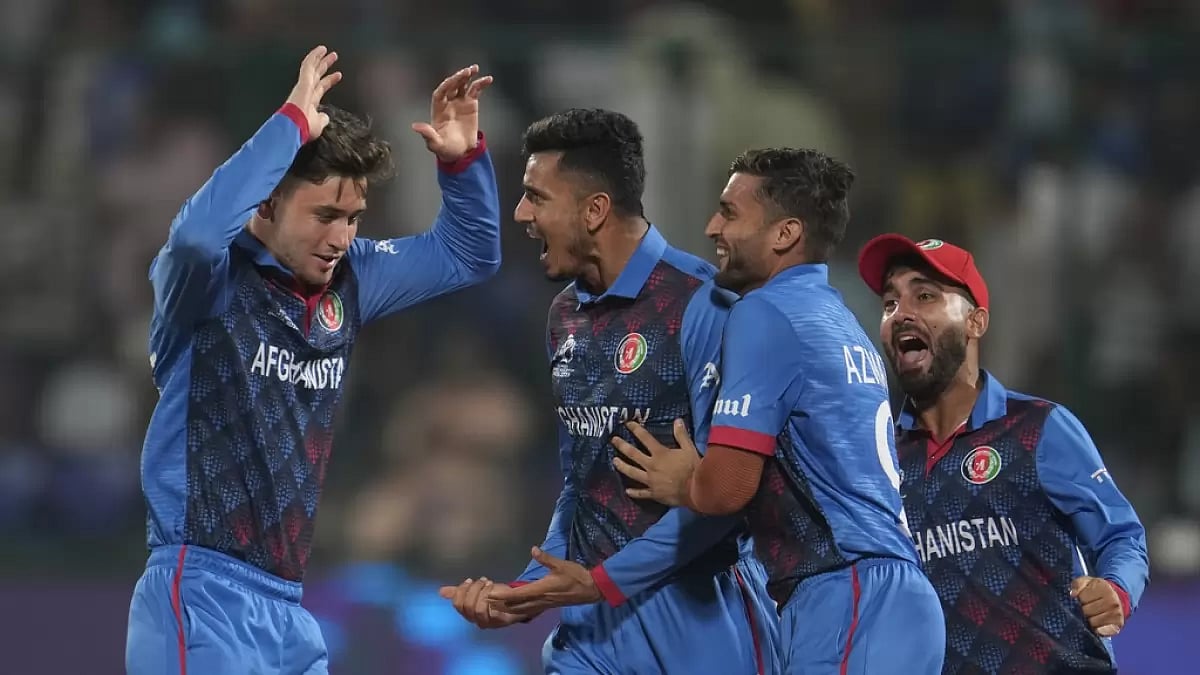 Afghanistan players celebrating after their victory against England in ICC Cricket World Cup 2023, Match 13, Delhi
