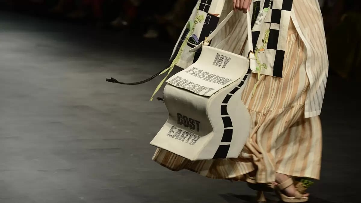 A bag reads 'My Fashion Doesn't Cost Earth' at the Amita Gupta show at Lakme Fashion Week