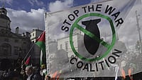 A banner calling to stop the war at a pro-Palestine protest in London