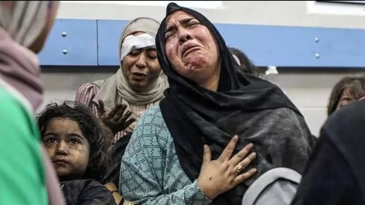 Wounded Palestinians at Gaza's Al-Ahli hospital 