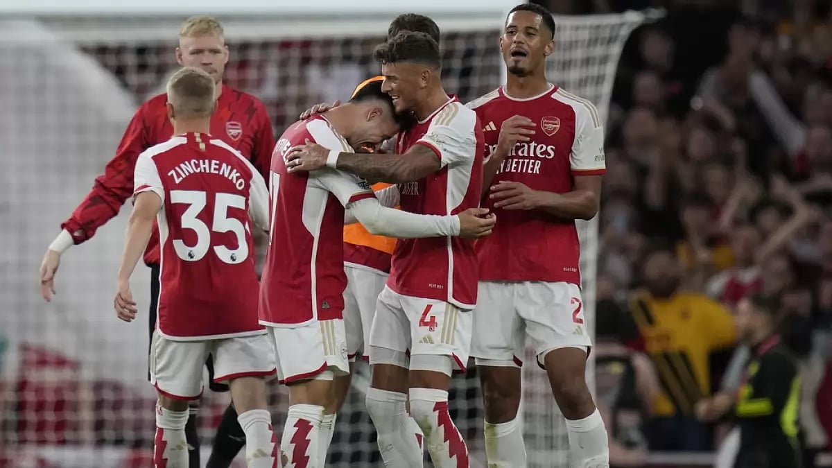 Arsenal players after their win against Manchester City in London