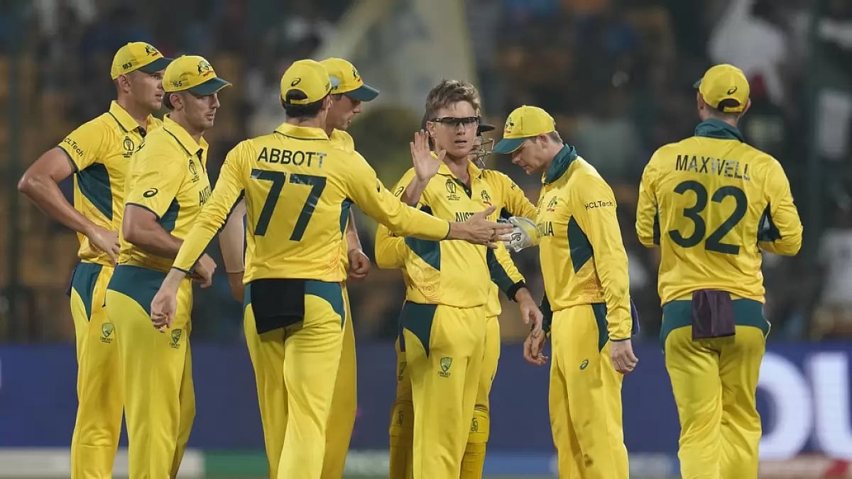 Australia celebrate the wicket of Pakistan's Mohammad Nawaz in Bengaluru.