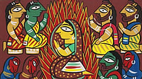 This image depicts a scene from the epic Hindu mythological poem, the Ramayana. Sita proves her innocence by undergoing a fire-ordeal. She is pictured sitting on a burning pyre amid fierce flames.