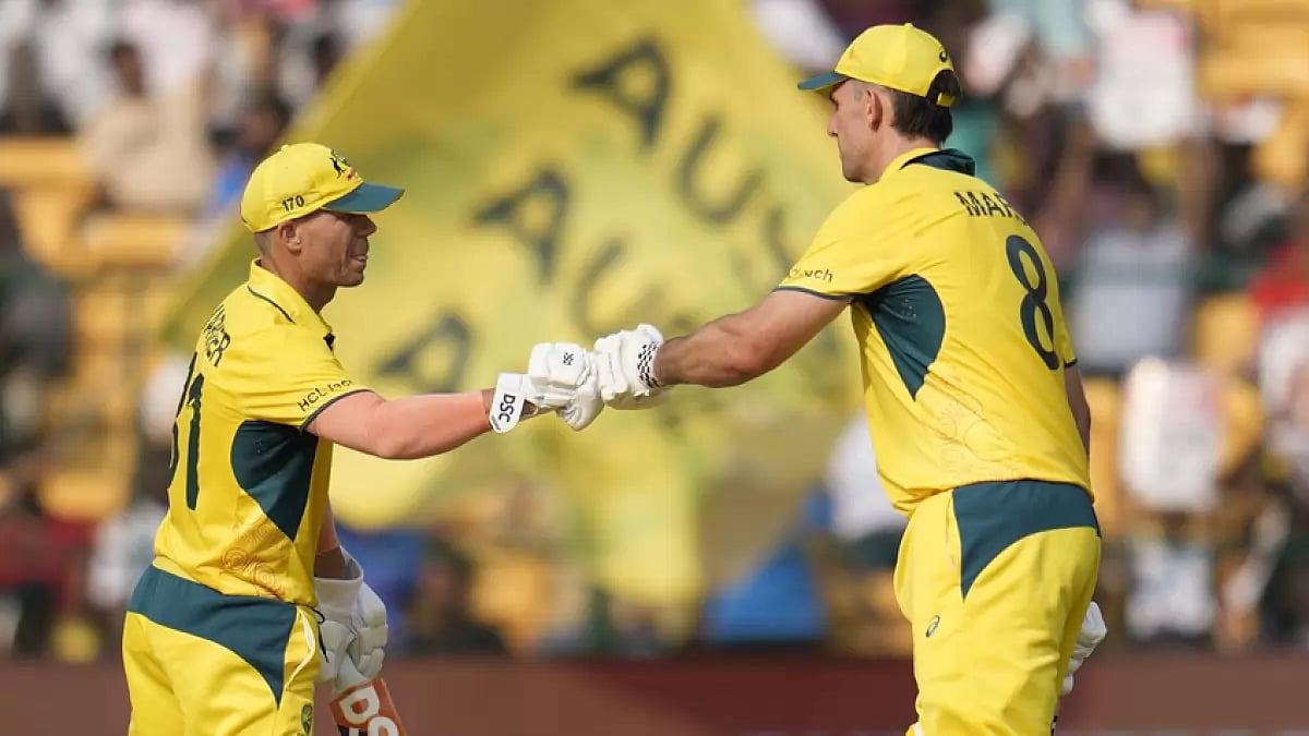 Australia's David Warner (left) with Mitchell Marsh during their epic stand against Pakistan