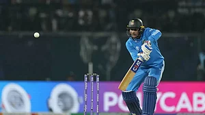 Shubman Gill bats during the India vs New Zealand game in Dharamsala.