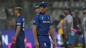 A disappointed Jos Buttler after losing the match against South Africa in Dharamsala.