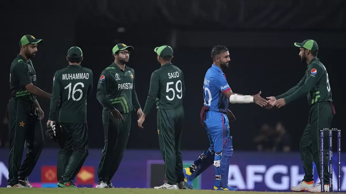 Players from both teams shaking hands after Afghanistan won the match by 8 wickets.