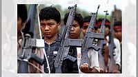 The Karen Guerilla growing out Of childhood with a gun in hand on January 12th, 1988, Myanmar. 