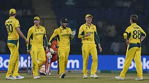 Australia celebrate Paul van Meekeren's wicket in Delhi.