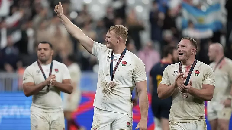 England rugby players celebrating a win. - File Photo