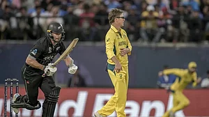 Australia won by 5 runs in a close encounter against New Zealand at Dharamsala