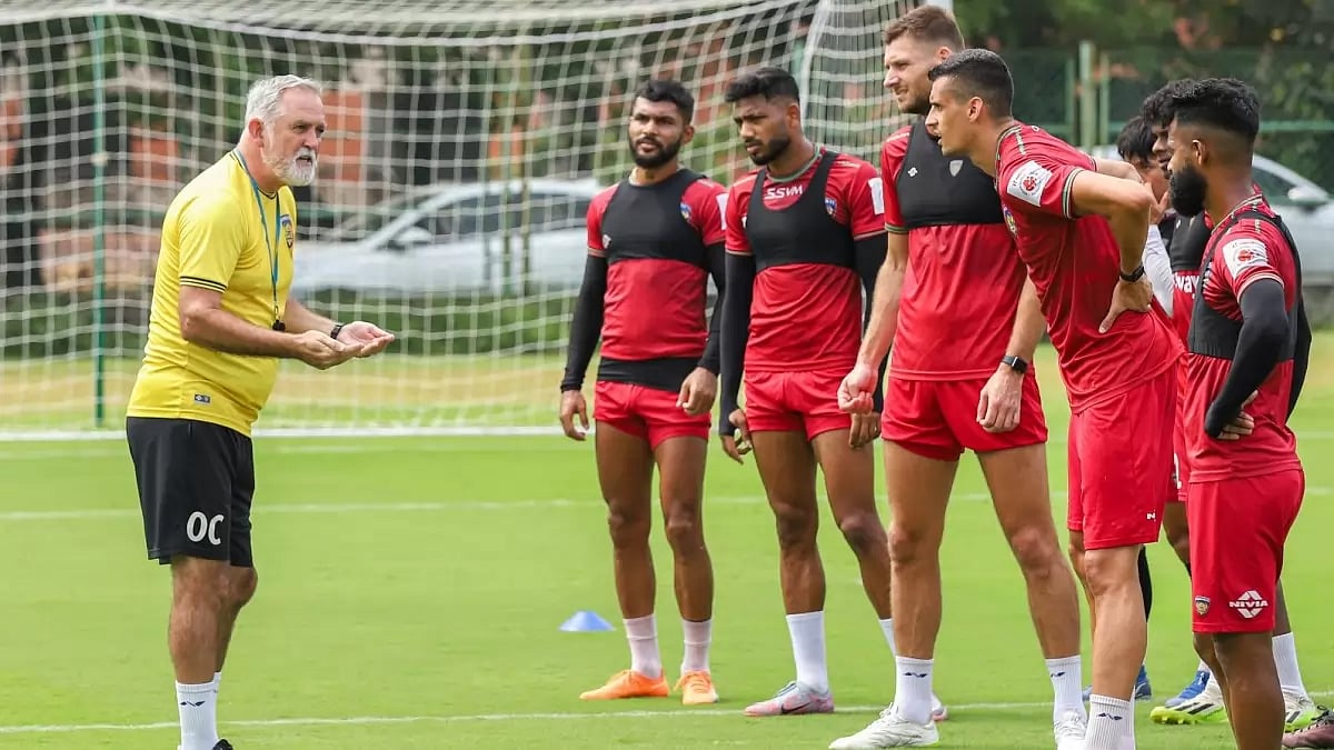 Coach Owen Coyle (L) with Chennaiyin FC players at a training session in Chennai.