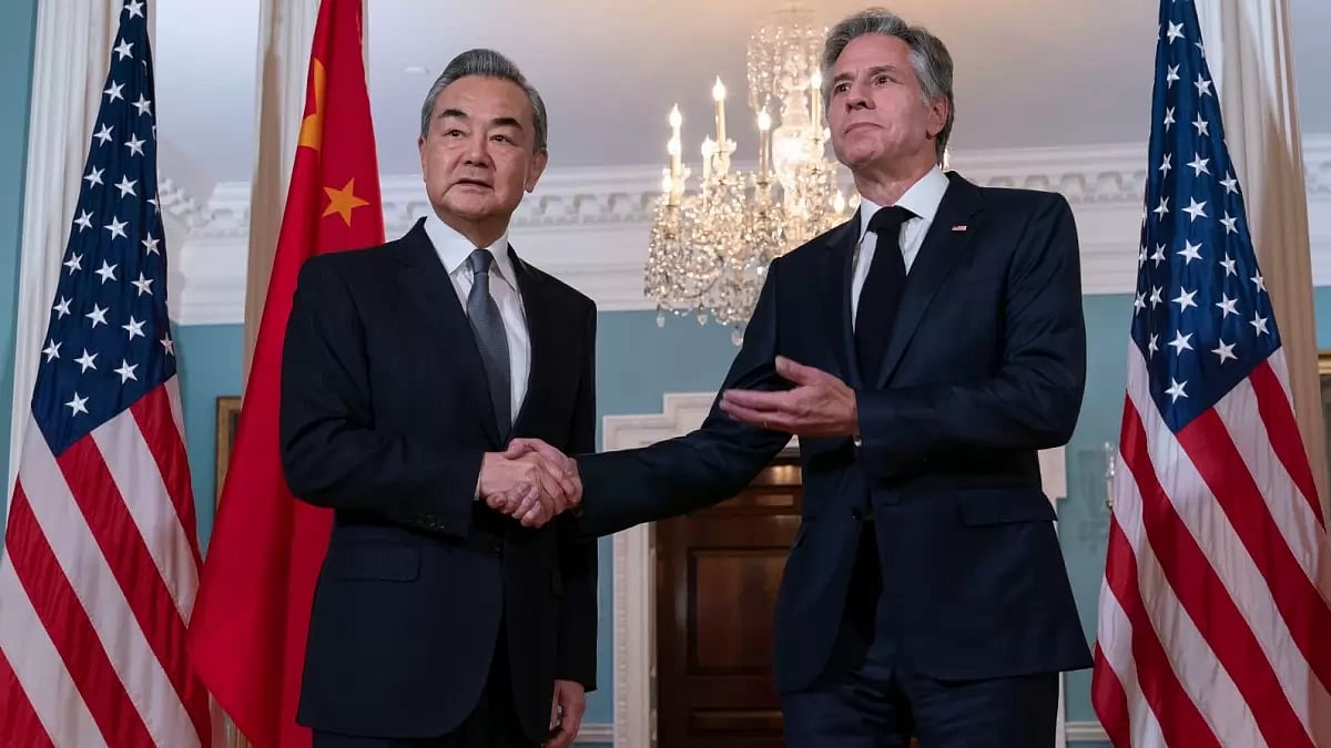 US Secretary of State Antony Blinken shakes hands with China's Foreign Minister Wang Yi at Washington DC. 