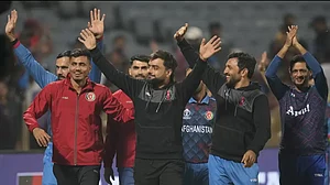 Afghanistan acknowledge the spectators after their win over Sri Lanka in Pune.