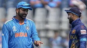 Indian skipper Rohit Sharma (left) with his SL counterpart Kusal Mendis at the toss
