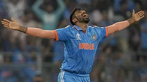 Jasprit Bumrah celebrates the first-ball wicket at the Wankhede Stadium.