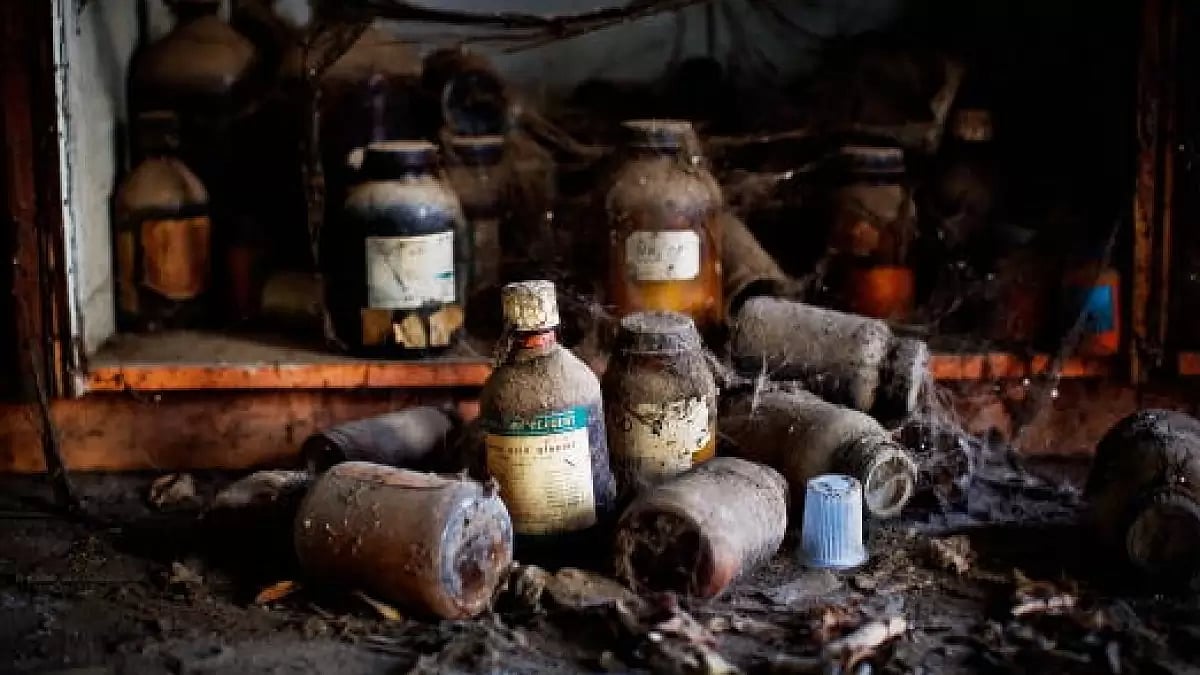 Bottles of chemicals lay on the floor at Bhopal's Union Carbide factory