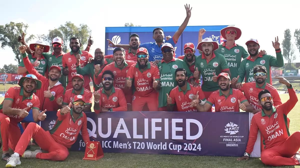 Oman players celebrate after qualifying for the 2024 T20 World Cup.  