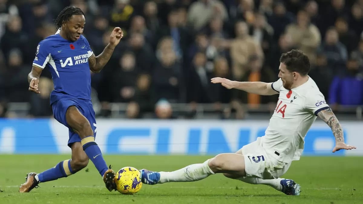 Chelsea's Raheem Sterling Battles For The Ball.