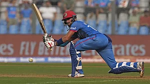 Ibrahim Zadran bats against Australia in Mumbai.