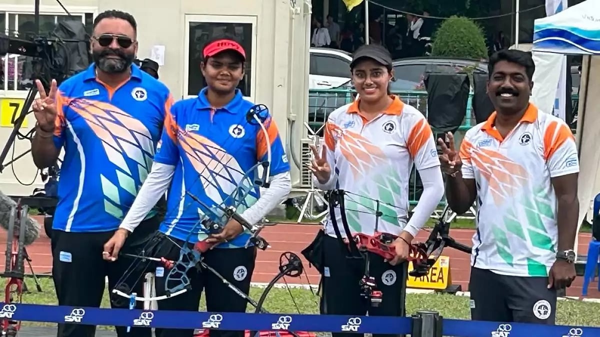 India's Parneet Kaur (second from right) celebrates after winning the compound individual gold.