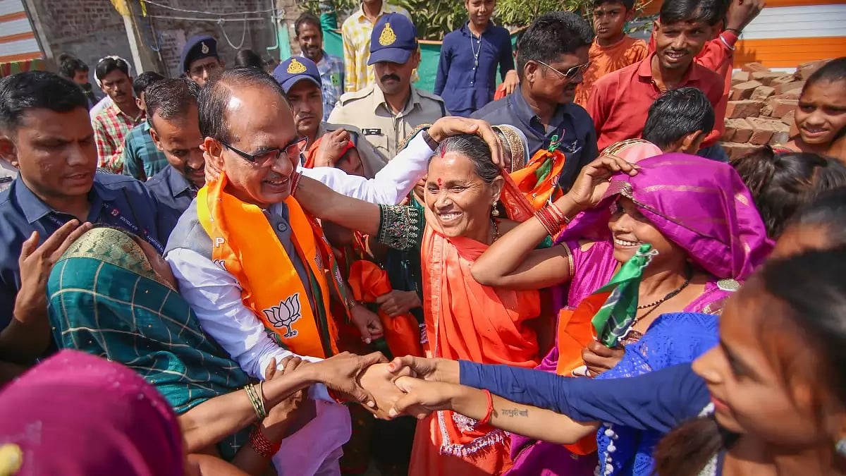 Madhya Pradesh Chief Minister Shivraj Singh Chouhan meets tribals during his campaign