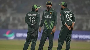 Pakistans Fakhar Zaman (C) talks to Mohammad Rizwan (L) during the 2023 ODI World Cup in Kolkata.