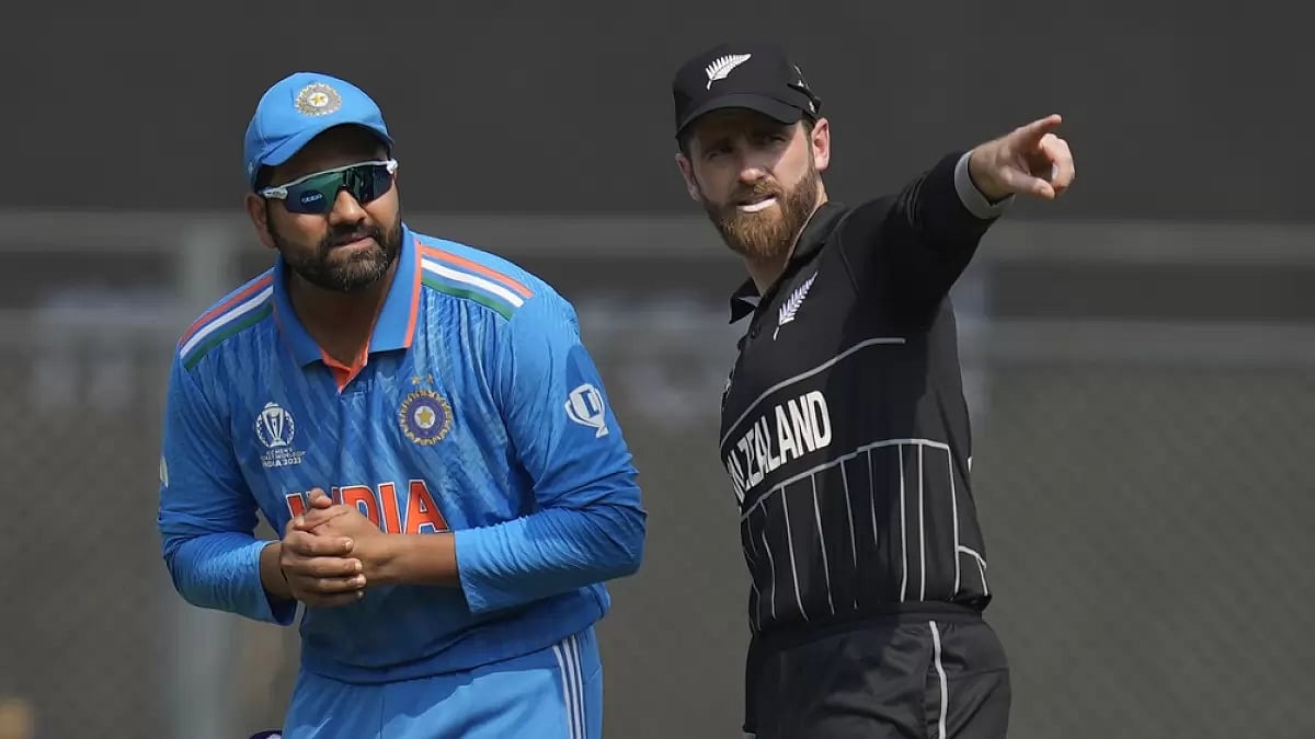 Indian skipper Rohit Sharma with Kiwi captain Kane Williamson (left) at the toss