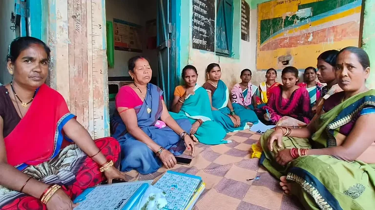 Sukara Sinha leads her team of Anganwadi workers in Tikanpal village - null