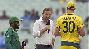 Temba Bavuma (L) and Pat Cummins (R) at the toss for the Australia vs South Africa semi-final.