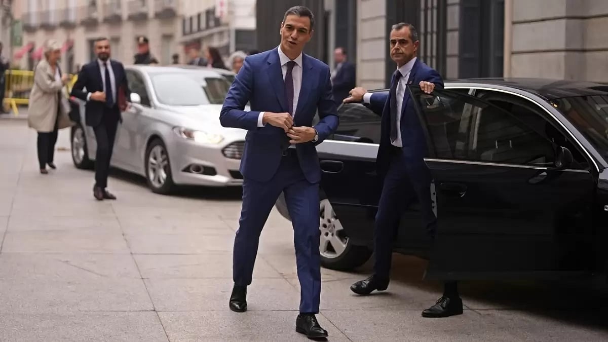 Spanish Prime Minister Pedro Sanchez wins new term. - null