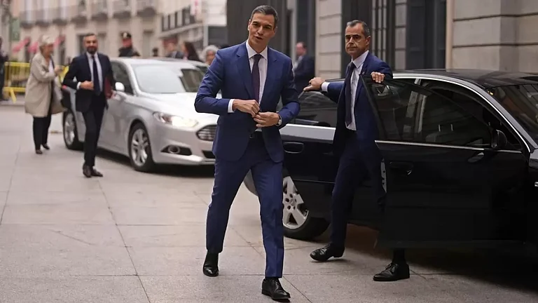 Spanish Prime Minister Pedro Sanchez wins new term. - null