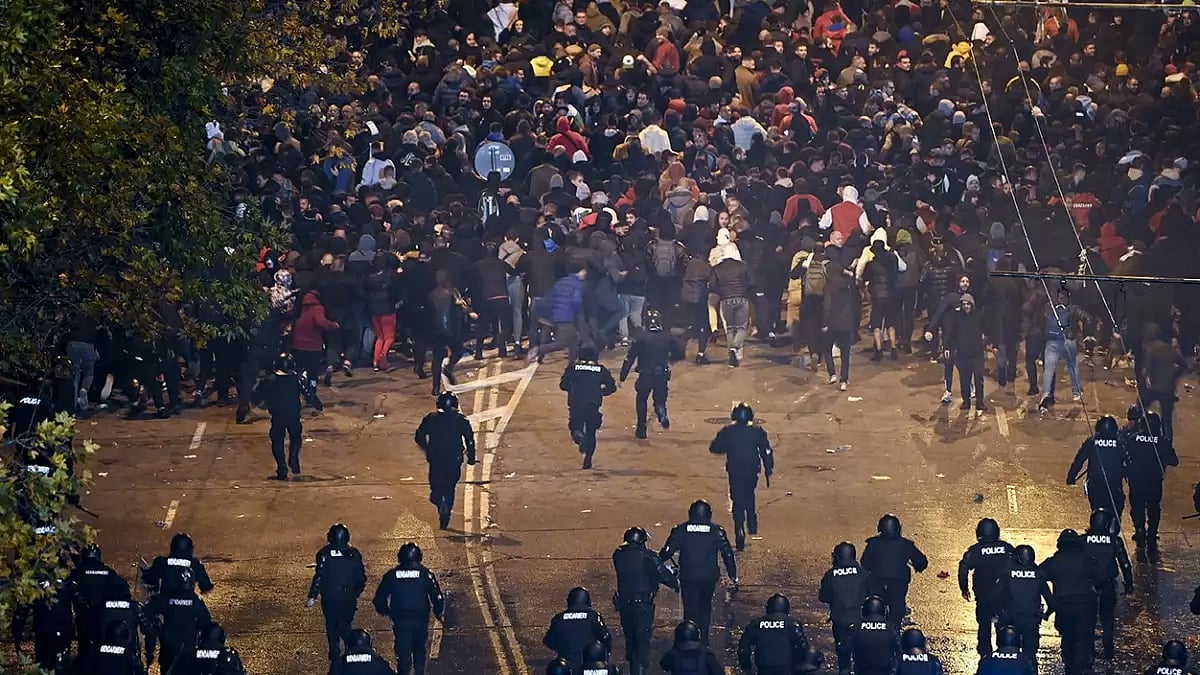 Security forces clash with Bulgarian fans outside the empty Vasil Levski National Stadium prior to the UEFA European Championship 2024 Group G qualifying football match between Bulgaria and Hungary in Sofia, Bulgaria.
