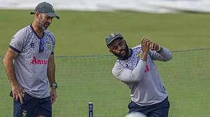 South Africa men's cricket team coach Rob Walter with captain Temba Bavuma during practice session