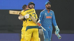 Travis Head and Marnus Labuschagne embrace during the ICC Cricket World Cup 2023 final against India in Ahmedabad.