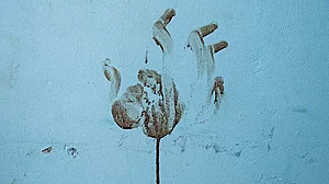 Bloody War: The stains of a blood-soaked hand on the wall of a bomb shelter near the Gaza Strip
