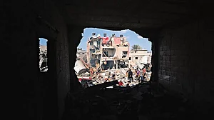 Reduced to Rubble: Civil defense teams and citizens conduct search and rescue operations after an Israeli airstrike hit a home in Khan Yunis, Gaza