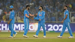 Indian players after they lost to Australia during the ICC World Cup final match in Ahmedabad