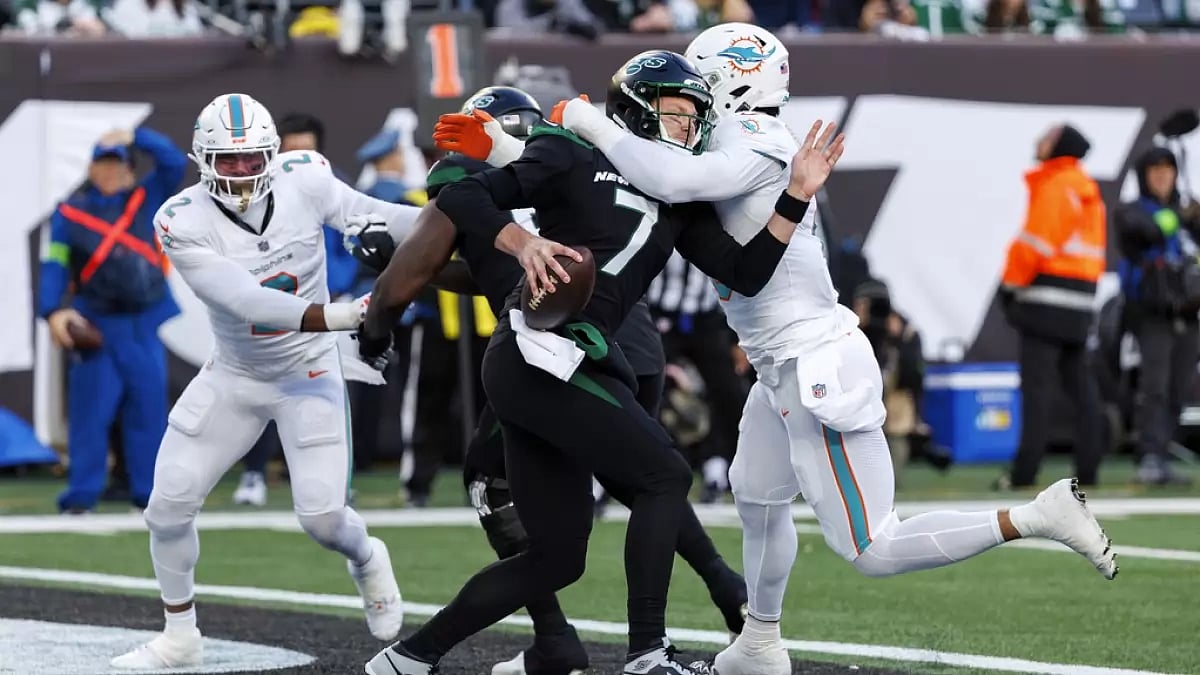 New York Jets quarterback Tim Boyle is sacked by Miami Dolphins linebacker Jaelan Phillips 