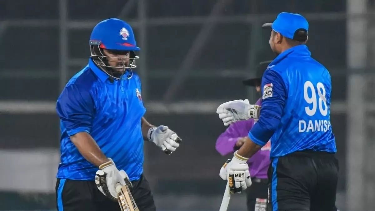 Karachi Whites wicket-keeper batter Azam Khan (L) during a match in National T20 Championships