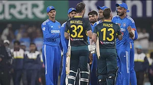 Indian players greeting Australia's Glenn Maxwell and Matthew Wade after their 5-wicket win in the 3rd T20I in Guwahati