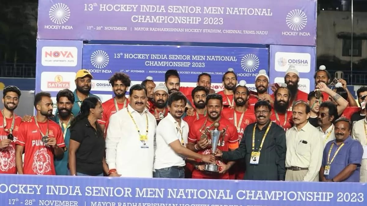 Punjab men's hockey team with the National Championship 2023 trophy.