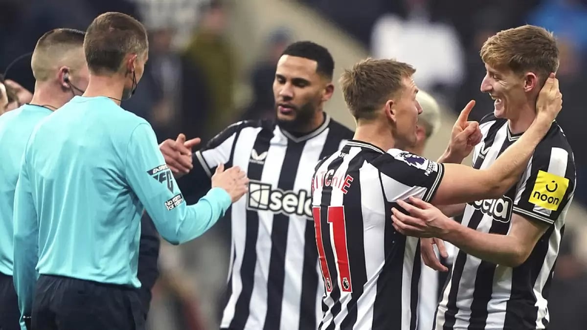 Newcastle United players celebrate their victory over Manchester United in the EPL football match