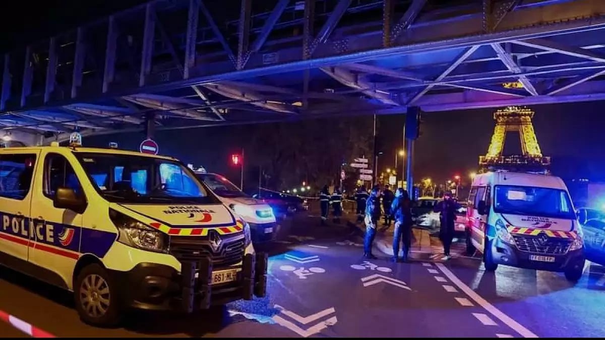 Tragedy struck near the Eiffel Tower as a knife and hammer attack claimed one life and left two injured.
